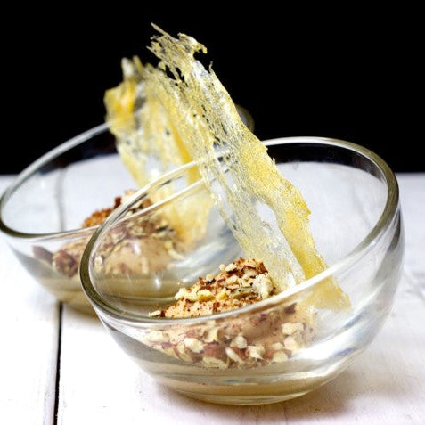 delicious Coffee Mousse using Easy Whip set in a clear glass bowl on a wooden kitchen table to enjoy on its own or part of a dessert with complimentary flavours such as finely grated dark chocolate