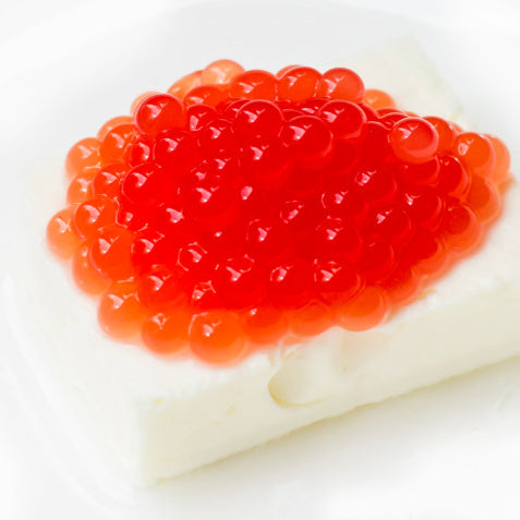 Bright red watermelon caviar made using Special Ingredients  Sodium Alginate and Sodium Citrate